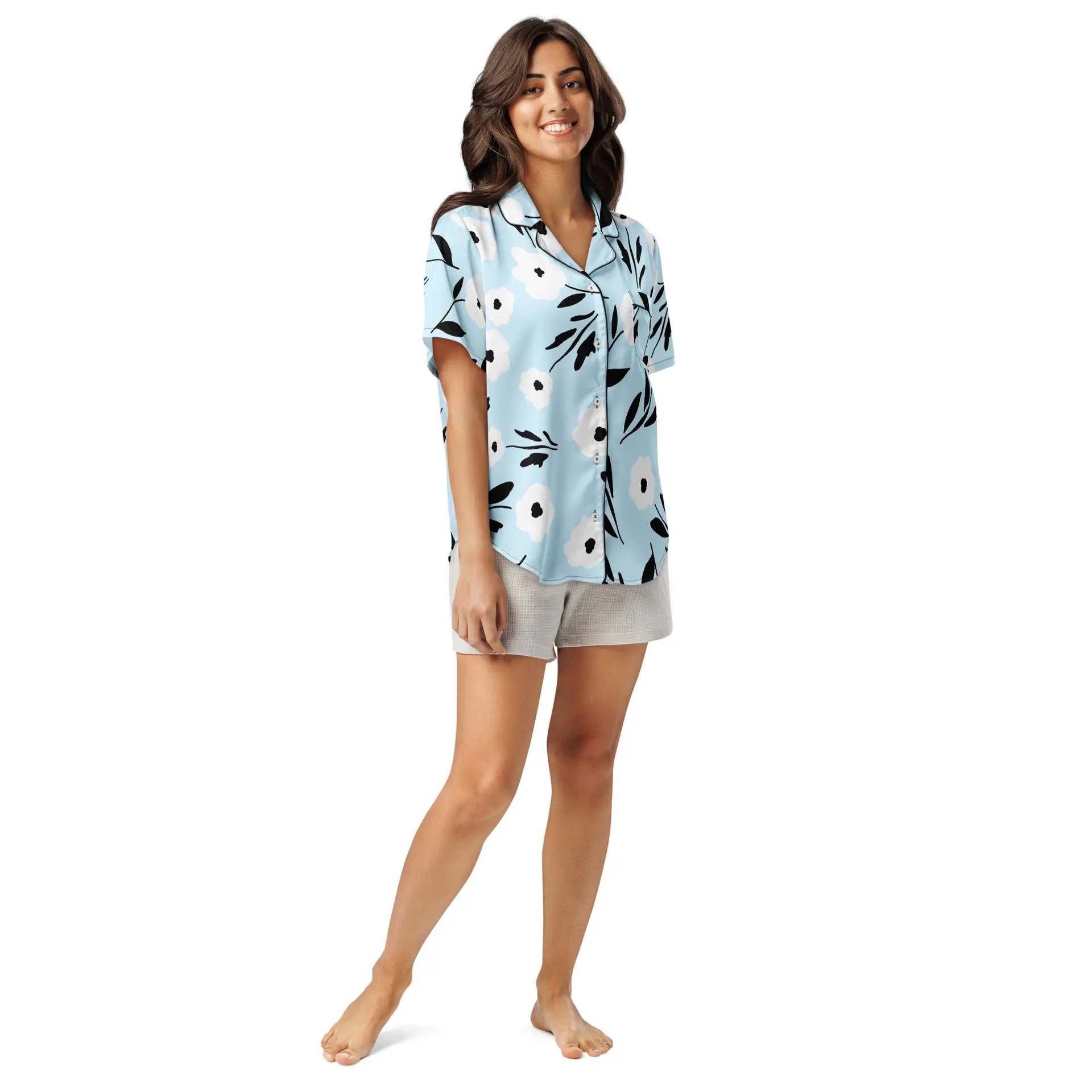 all-over-print-womens-short-sleeve-pajama-top-black-front-67c1512305207.jpg ViaFashion Soft Blue Floral Women’s Short Sleeve Pajama Top - Image 1
