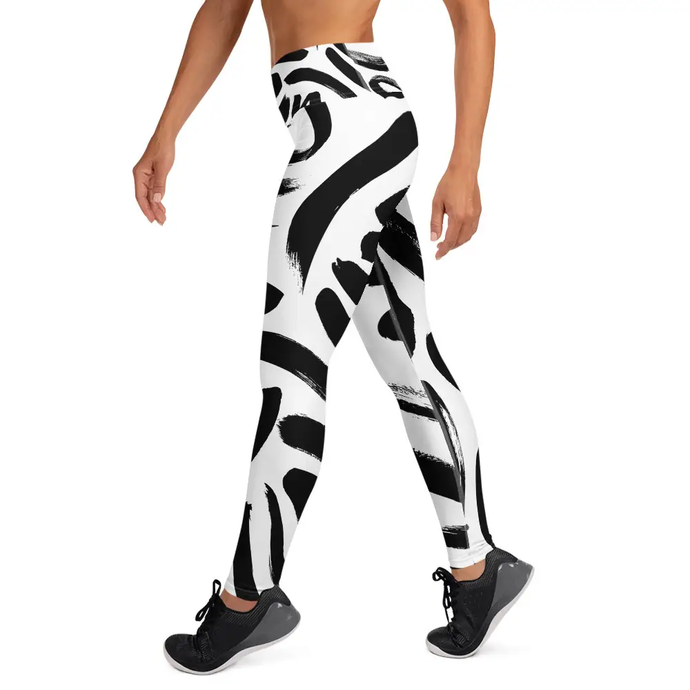 all-over-print-yoga-leggings-white-left-67c0c053c2c0d.jpg ViaFashion InkFlow High-Waist Yoga Leggings – Bold Black Brushstroke Design, Ultra-Stretch & Breathable - Image 1